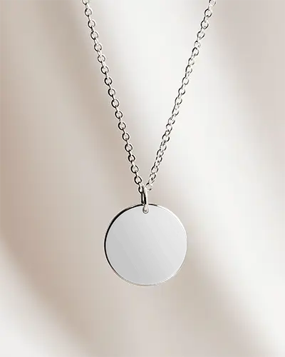 premium-jewelry-showcase-round-pendant-mockup-luxury-chain-against-soft-neutral-drape