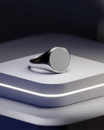 Black Metallic Ring Mockup On Geometric Podium Under Soft Spotlight With Etched Dandelion Detail
