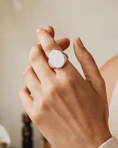 Modern Ring Mockup On Hand Closeup Natural Lighting Soft Tones With Neutral Background Focus