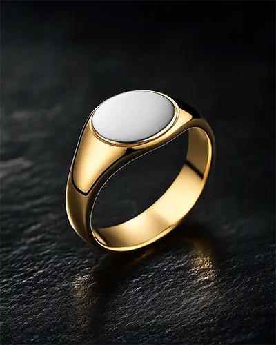 gold-signet-ring-mockup-on-black-leather-surface-with-glossy-light-reflection-luxury-jewelry-focus