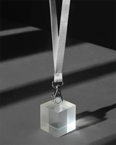 Sleek Minimalistic Lanyard Mockup With Metal Clip And Transparent Geometric Cube Mockup Design