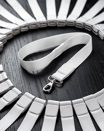 Lanyard Mockup With Metal Clip Surrounded By Stacked Lanyards On Dark Wooden Surface Organized And Elegant Presentation 034