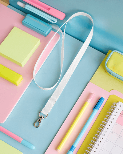 Lanyard Mockup With Metal Clip On Colorful Desk Surrounded By Stationery Creative And Playful Setup 036