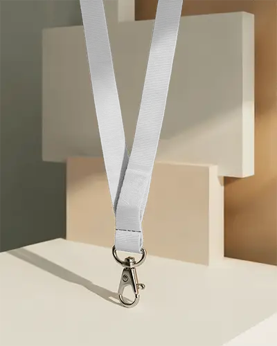 Lanyard Mockup Hanging Freely On Minimal Geometric Platforms With Metal Clip And Straight Flat Strap