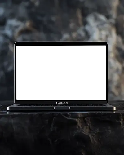 Modern Macbook Air M1 On Black Textured Surface With Clean Empty Screen And Sharp Focus
