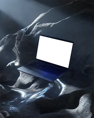 Floating Macbook Air M1 Laptop On Rock Textured Surface With Dramatic Lighting And Empty Screen