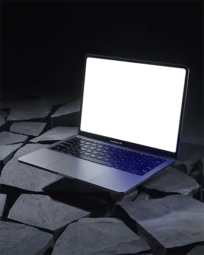 Macbook Air M1 Mockup On Dark Split Stone Surface With Moody Lighting And Dramatic Shadows
