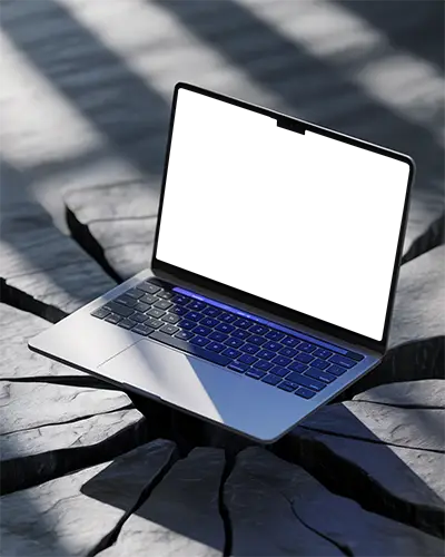 Macbook Pro M1 Mockup On Split Stone Surface With Bold Shadows And Natural Daylight Highlights