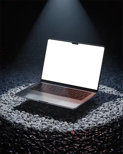 Macbook M3 Pro Mockup Hovering Above Dual Tone Gravel Circle Under Spotlight With Spark Particles Dramatic And High Contrast Scene