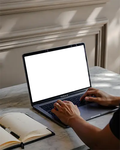 Macbook Air M1 On Marble Desk Person Typing Sunlight Open Planner Classic Panel Wall