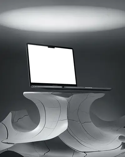 Macbook Air M3 Mockup On Cracked Sculpture Pedestal Under Soft Spotlight In Dark Room