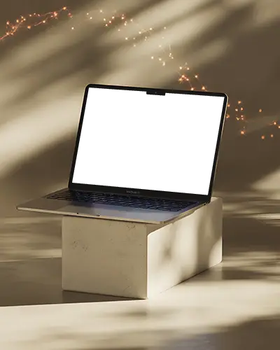 Soft Light Shadow Macbook Air M3 Mockup On Angled Block With Glowing Spark Particles