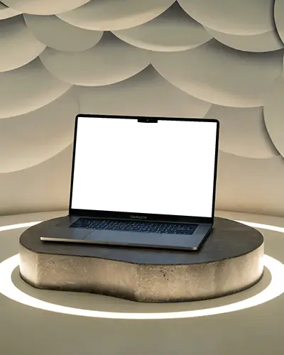 abstract-cloud-wall-macbook-air-m3-mockup-on-sculpted-base-in-modern-lighting