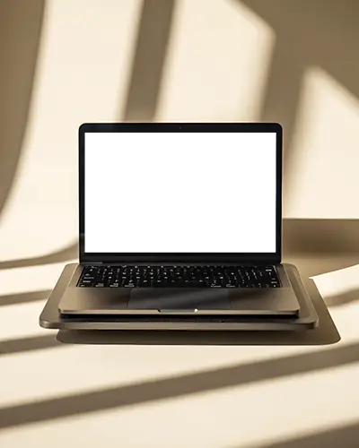 sunlit-shadow-play-macbook-m1-pro-mockup-front-view-on-warm-beige-minimal-background