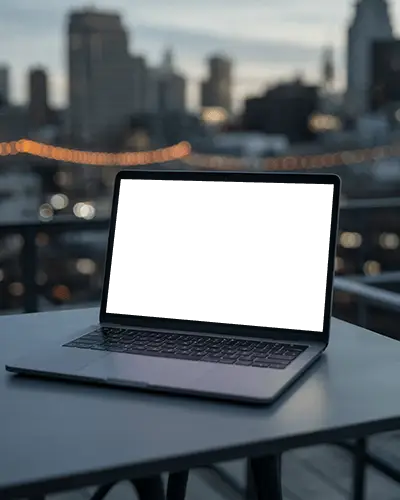 Urban Evening Scene Macbook M1 Pro Mockup On Balcony Table With Blurred City Background