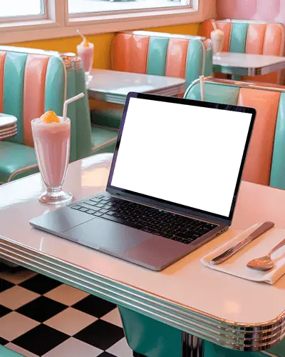 Retro Diner Macbook M1 Pro Mockup On Pink Table With Milkshake And Vintage Booth Background