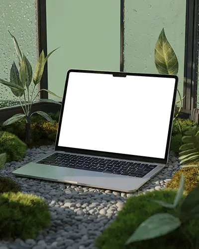Macbook M4 Air Mockup On Pebble Path Amid Greenery And Moist Glass Walls In Soft Light