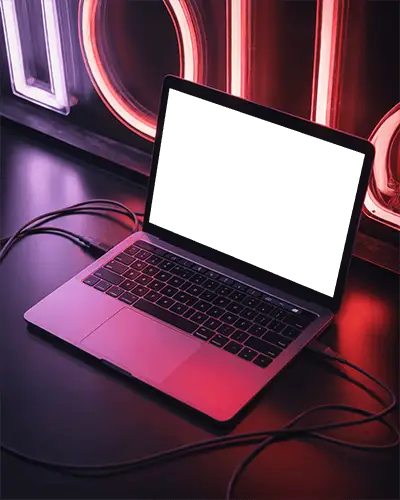 Wired Macbook M1 Pro Mockup Against Neon Sign With Pink Purple Light Reflections