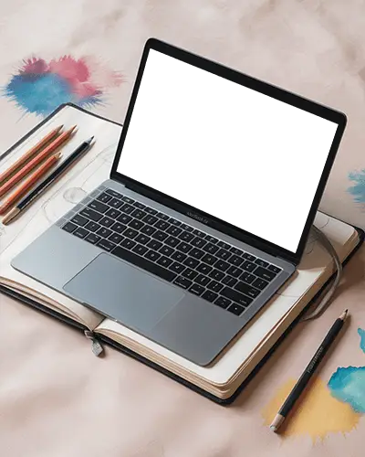 Artistic Desk Scene Macbook Air M1 Mockup On Sketchbook With Colored Pencils And Ink