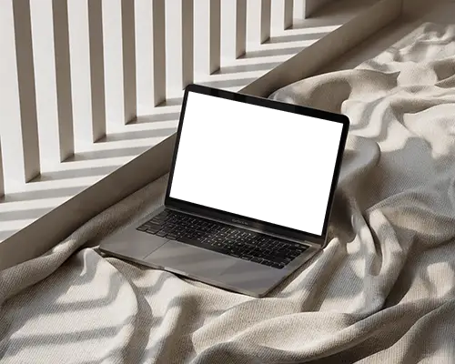 Macbook Air M1 Mockup On Soft Fabric Surface With Sunlight Filtered Through Vertical Shades