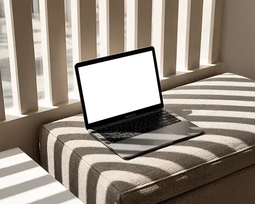 Macbook Air M1 Mockup On Soft Bench With Sunlight Filtering Through Modern Vertical Blinds