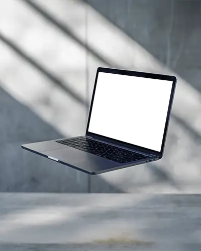 Floating Macbook Pro M1 Mockup In Concrete Studio Light Casting Sharp Shadow Lines
