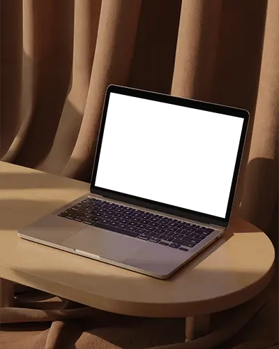 Macbook M1 Pro Mockup On Wooden Table With Soft Curtains And Warm Sunlight In Studio