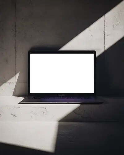 Spotlight Scene Macbook Air M1 Mockup With Concrete Wall Textured Concrete Backdrop