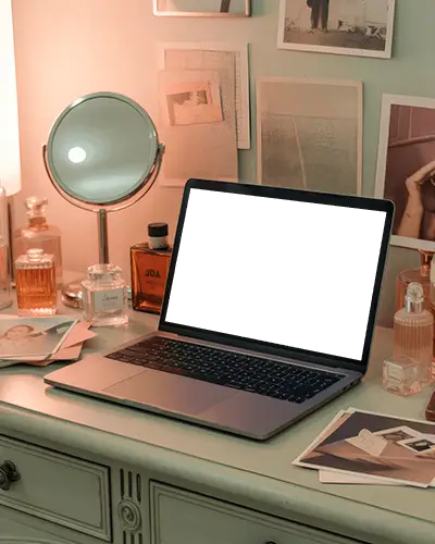 Macbook Pro M1 Mockup On Vanity Desk With Perfume Bottles Mirror And Soft Feminine Light