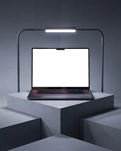 spotlight-macbook-m4-pro-mockup-on-angular-platform-with-industrial-arch-lighting-frame