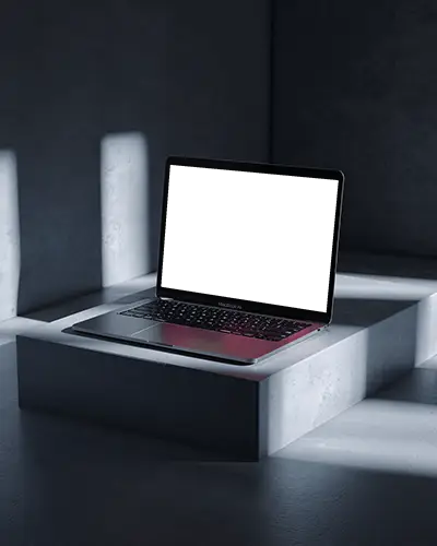 macbook-m1-air-mockup-on-concrete-platform-with-dramatic-light-and-deep-shadow-box