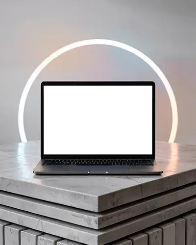 macbook-pro-m1-mockup-on-marble-pedestal-with-glowing-led-circle-and-modern-gallery-vibe