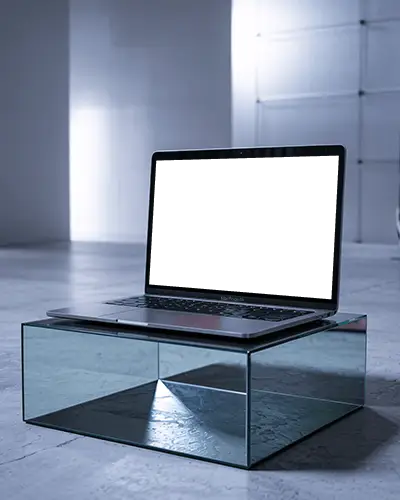 M1 Air Mockup On Mirrored Glass Block In Soft Lit Minimalist Room With Modern Concrete Floor