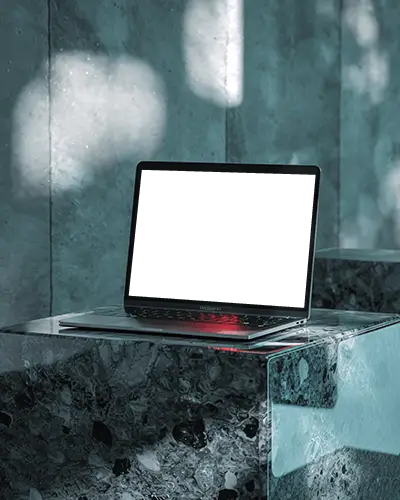 M1 Air Mockup On Glassy Stone Block In Elegant Sun Dappled Room With Mint Green Tones