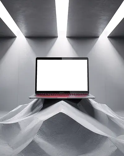 M1 Air Mockup On Sculpted Mountain Form Platform With Soft Spotlights In Minimal Studio