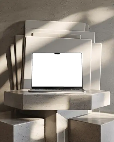 Minimalist Studio Scene With M4 Pro On Geometric Table And Soft Morning Light Shadows