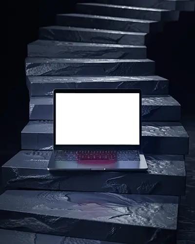 M1 Pro Mockup On Dark Sculpted Stone Stairs With Moody Lighting And Glowing Red Keys