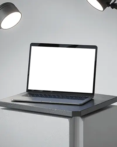 M1 Pro Mockup On Minimal Pedestal Under Dual Spotlights In Clean Product Studio Setting