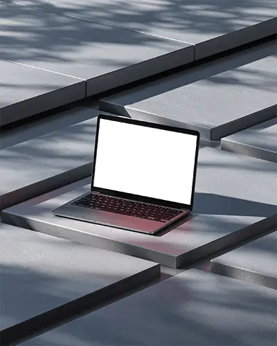 M1 Pro Mockup On Minimal Sunken Platform With Geometric Concrete Tiles And Soft Shadows