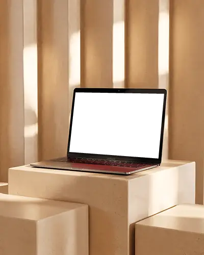 M1 Air Mockup On Sunlit Sandstone Podium With Minimal Columns And Soft Glow Lighting