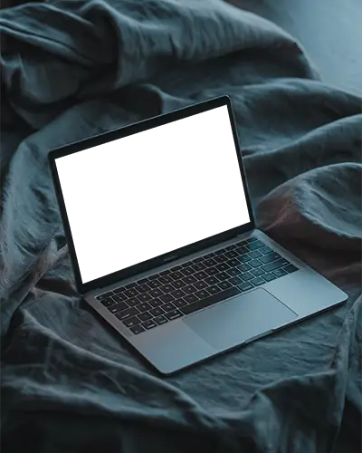 M1 Sleek Macbook Mockup On Soft Fabric Ideal For Technology And Digital Marketing Presentations