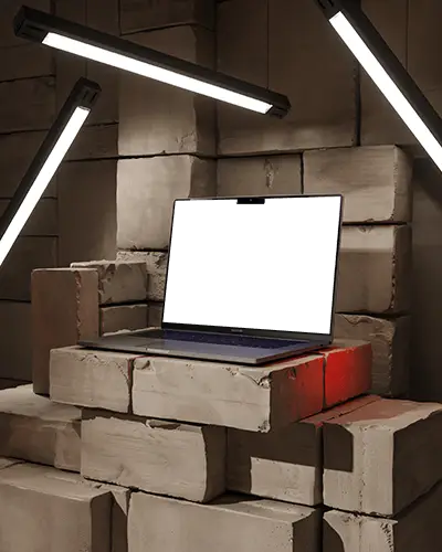 M2 Professional Macbook Mockup On Textured Stone Surface For Web Design Showcase