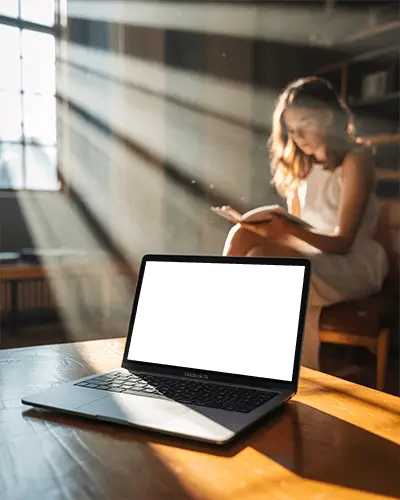 Sunlit Reading Nook Macbook M1 Air Mockup With Soft Golden Rays And Cozy Ambient Light