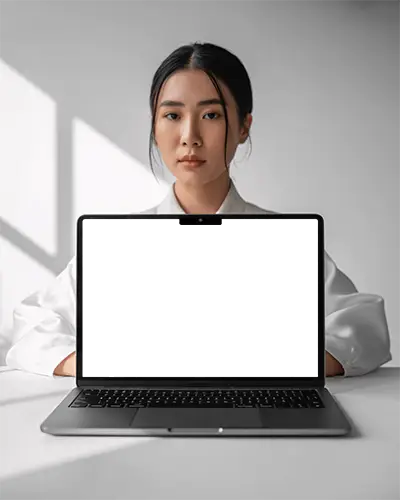 Calm Soft Shadow Studio Macbook M5 Air Mockup Featuring Poised Front Facing Model