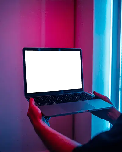 Neon Dual Tone M1 Pro Mockup Held Against Hyper Modern Cyber Light Panels