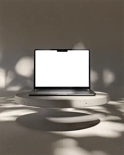 Macbook M2 Air Mockup Floating On Round Stone Platform With Soft Dappled Natural Light