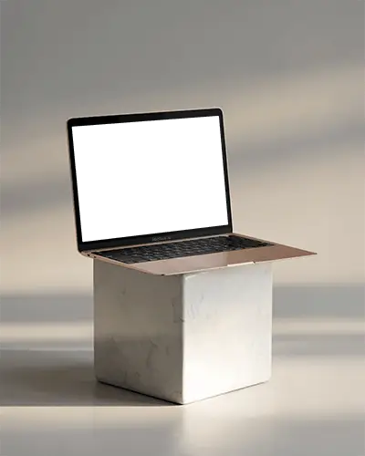 Macbook M1 Air Mockup On Marble Cube With Soft Sunlight And Clean Minimal Modern Styling