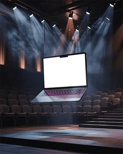 Macbook Pro M2 Mockup Floating On Stage With Dramatic Spotlights And Cinematic Theater Atmosphere