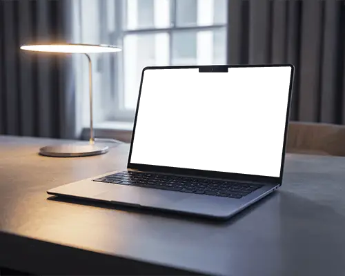 Macbook Pro M3 Mockup On Modern Desk With Soft Lamp Glow And Evening Window Light Ambience