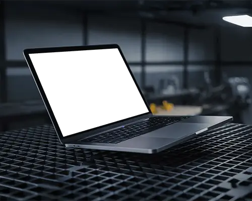 Macbook Pro M1 Mockup On Industrial Grid Table With Moody Lighting And Modern Tech Atmosphere